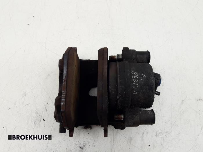 Front brake calliper, left from a Volkswagen Golf VII (AUA) 1.0 TSI 12V BlueMotion 2019