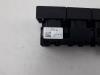 Central locking switch from a Skoda Octavia Combi (5EAC) 1.6 TDI Greenline 16V 2014
