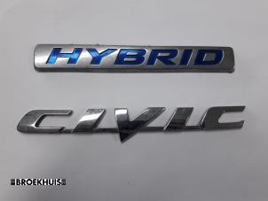 Używane Emblemat Honda Civic (FA/FD) 1.3 Hybrid Cena € 10,00 Procedura marży oferowane przez Autobedrijf Broekhuis B.V.