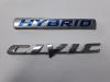 Emblem van een Honda Civic (FA/FD), 2005 / 2012 1.3 Hybrid, Limousine, 4-tr, Elektrisch Benzin, 1.339cc, 70kW (95pk), FWD, LDA2, 2006-01 / 2010-12, FD3 2009