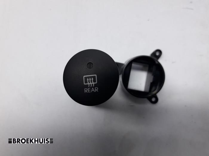 Interruptor de calefactor luneta de un Hyundai iX35 (LM)  2012