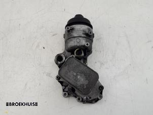 Used Oil filter housing Peugeot 208 II (UB/UH/UP) 1.5 BlueHDi 100 Price on request offered by Autobedrijf Broekhuis B.V.