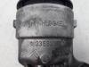 Oil filter housing from a Peugeot 208 II (UB/UH/UP) 1.5 BlueHDi 100 2020