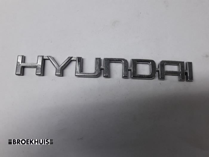 Emblem from a Hyundai Getz 1.3i 12V 2005