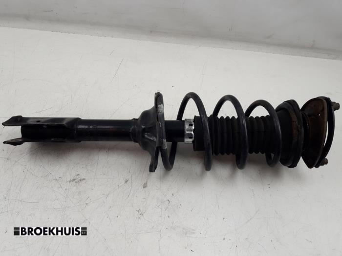 Front shock absorber rod, left from a Toyota Yaris Verso (P2) 1.5 16V 2000
