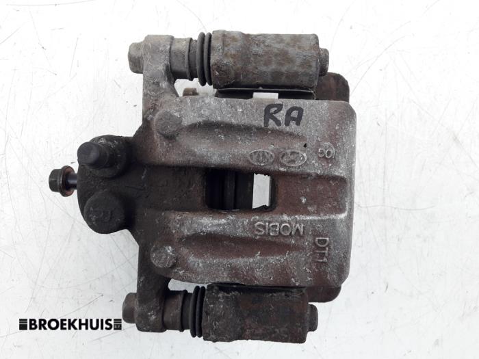 Rear brake calliper, right from a Kia Sportage (SL) 2.0 CVVT 16V 4x2 2010