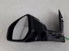 Wing mirror, left from a Ford Transit Courier 1.5 TDCi 75 2021