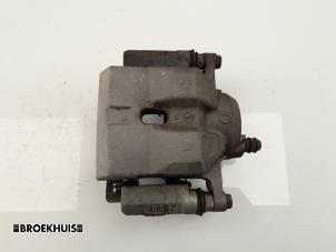 Used Front brake calliper, left Lexus CT 200h 1.8 16V Price € 85,00 Margin scheme offered by Autobedrijf Broekhuis B.V.