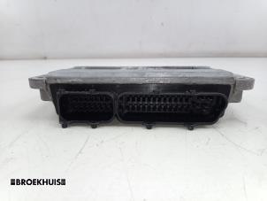 Engine management computer from a Seat Ibiza IV (6J5) 1.4 16V 2012