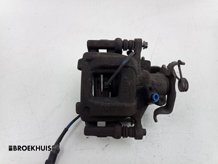 Gebrauchte Bremszange links hinten Ford Transit Custom 2.0 TDCi 16V Eco Blue 130 Preis € 30,25 Mit Mehrwertsteuer angeboten von Autobedrijf Broekhuis B.V.