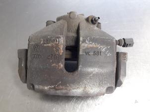 Used Front brake calliper, left Volkswagen Touran (1T1/T2) 2.0 TDI DPF Price € 25,00 Margin scheme offered by Autobedrijf Broekhuis B.V.