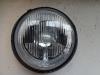Headlight, left from a Landrover Defender I, 1990 / 2016 2.5 TD5, Jeep/SUV, Diesel, 2.495cc, 90kW (122pk), 4x4, 15P, 2001-09 / 2006-12 2003