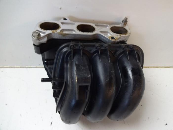 Intake manifold from a Daihatsu Cuore (L251/271/276) 1.0 12V DVVT 2009