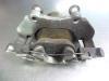 Front brake calliper, left from a Ford Focus 3 Wagon 1.6 SCTi 16V 2012