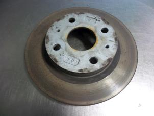 Used Front brake disc Daihatsu Cuore (L251/271/276) 1.0 12V DVVT Price € 15,00 Margin scheme offered by Autobedrijf Broekhuis B.V.