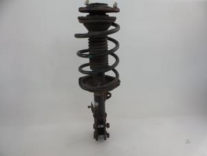Used Front shock absorber rod, left Toyota Corolla (E12) 1.4 D-4D 16V Price € 35,00 Margin scheme offered by Autobedrijf Broekhuis B.V.
