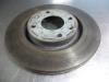 Front brake disc from a Citroen Xsara Picasso (CH), 1999 / 2012 1.6i 16V, MPV, Petrol, 1.587cc, 80kW (109pk), FWD, TU5JP4; NFU, 2005-09 / 2011-12, CHNFU 2006