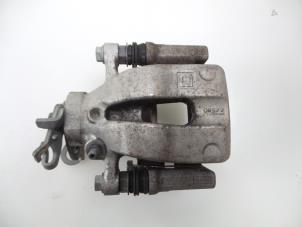 Used Rear brake calliper, left Opel Corsa E 1.0 SIDI Turbo 12V Price € 35,00 Margin scheme offered by Autobedrijf Broekhuis B.V.