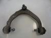 Front upper wishbone, left from a BMW X6 (E71/72) xDrive35d 3.0 24V 2009