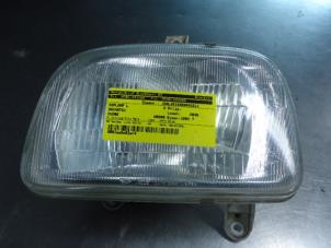 Used Headlight, left Daihatsu Cuore (L251/271/276) 850,Domino Price € 25,00 Margin scheme offered by Autobedrijf Broekhuis B.V.