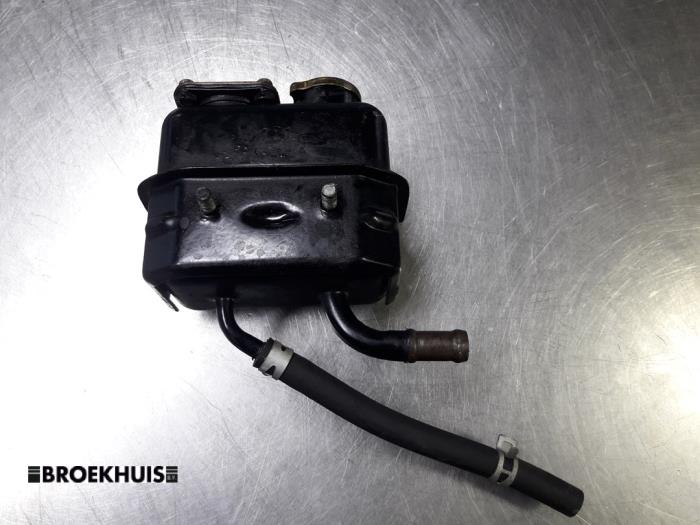 Power steering fluid reservoir from a Mitsubishi Canter 3C13 2001