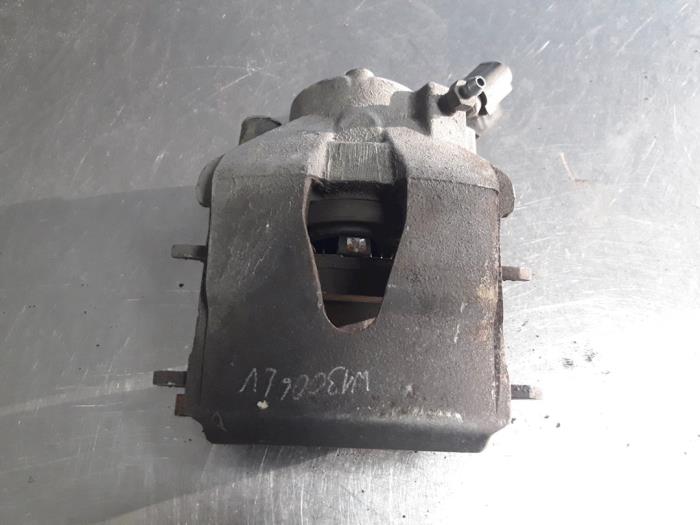 Front brake calliper, left from a Skoda Yeti (5LAC) 1.2 TSI 16V 2010