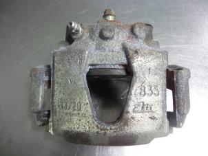 Used Front brake calliper, right Daewoo Lanos (TA/TF08/48/86) 1.3 Price € 15,00 Margin scheme offered by Autobedrijf Broekhuis B.V.