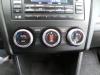Panel de control de calefacción de un Subaru XV (GP) 2.0 AWD 16V 2014