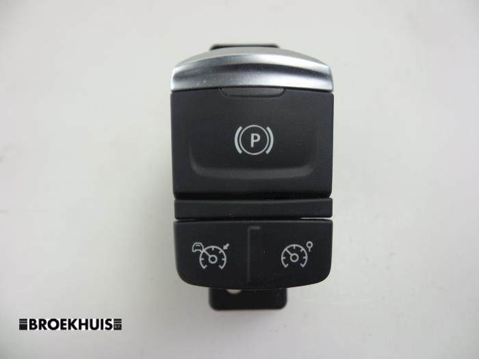 Parking brake switch from a Renault Espace (RFCJ) 1.6 Tce 200 EDC 2015
