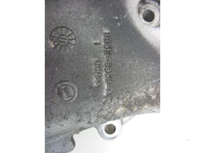 Timing cover from a Land Rover Discovery Sport (LC) 2.0 Si4 16V 2015