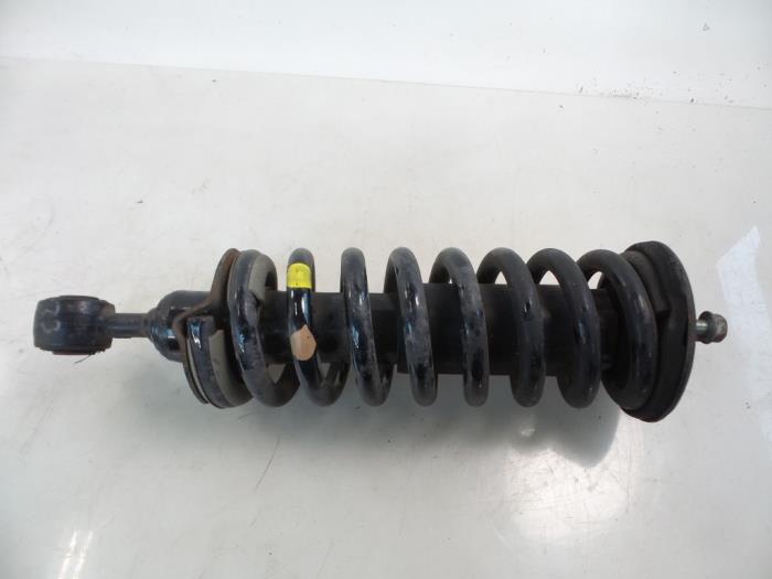 Used Nissan Navara (D40) 2.5 dCi 16V 4x4 Front shock absorber rod, left ...