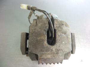 Used Front brake calliper, left BMW 5 serie (E60) 523i 24V Price € 15,00 Margin scheme offered by Autobedrijf Broekhuis B.V.