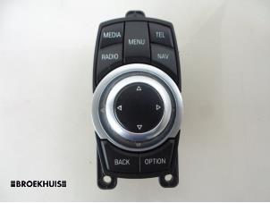 Used MMI switch BMW 1 serie (F20) 118d 2.0 16V Price € 50,00 Margin scheme offered by Autobedrijf Broekhuis B.V.