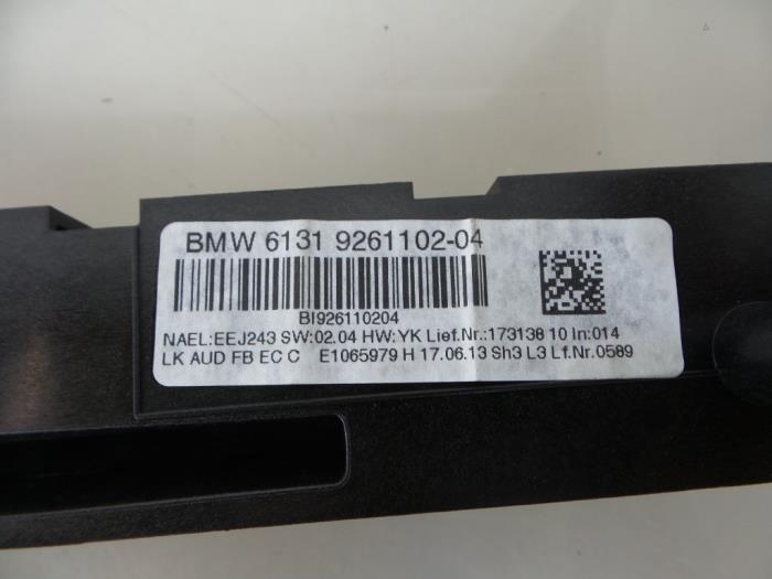 Panneau commande radio d'un BMW 1 serie (F20) 118d 2.0 16V 2013