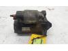 Starter from a Renault Clio III (BR/CR) 1.4 16V 2007