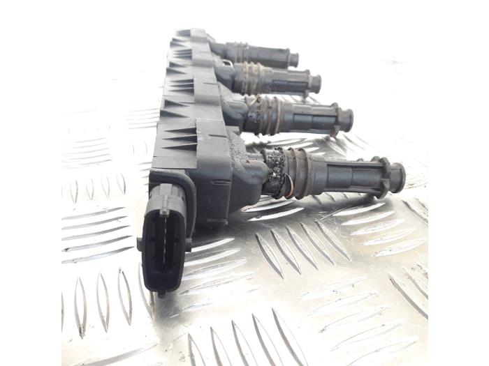 Ignition coil from a Opel Corsa B (73/78/79) 1.2i 16V 1999