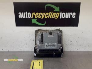 Engine management computer from a Volkswagen Passat Variant (3C5) 2.0 TDI 140 2007