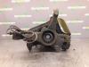 Knuckle, front right from a Opel Corsa D 1.4 16V Twinport 2007
