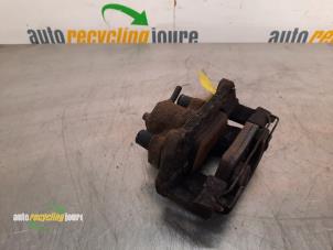 Used Front brake calliper, left BMW Mini One/Cooper (R50) 1.6 16V Cooper Price € 20,00 Margin scheme offered by Autorecycling Joure B.V.