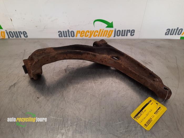 Front wishbone, left from a Volkswagen Transporter T5 2.5 TDi 4Motion 2007
