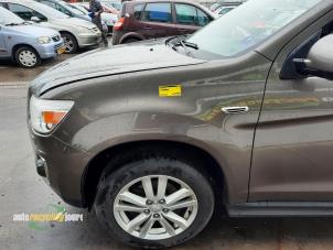 Used Front wing, left Mitsubishi ASX 1.6 MIVEC 16V Price on request offered by Autorecycling Joure B.V.