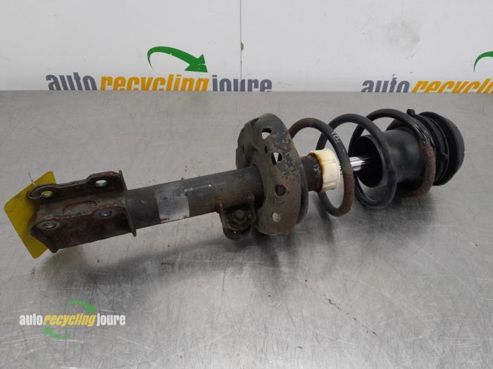 Front shock absorber rod, left from a Opel Zafira (F75) 2.2 16V 2000
