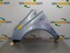 Front wing, left from a Opel Corsa D, 2006 / 2014 1.2 16V, Hatchback, Petrol, 1.229cc, 59kW (80pk), FWD, Z12XEP; EURO4, 2006-07 / 2014-08 2007