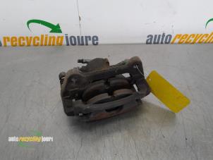 Used Front brake calliper, left Volkswagen Touran (5T1) 1.4 TSI Price € 19,99 Margin scheme offered by Autorecycling Joure B.V.
