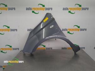 Used Front wing, left Nissan Note (E11) 1.4 16V Price on request offered by Autorecycling Joure B.V.