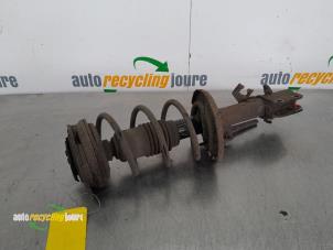 Used Front shock absorber rod, right Nissan Note (E11) 1.4 16V Price € 49,99 Margin scheme offered by Autorecycling Joure B.V.
