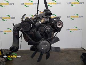 Motor van een Nissan Trade 3.0 TDI 100 1998