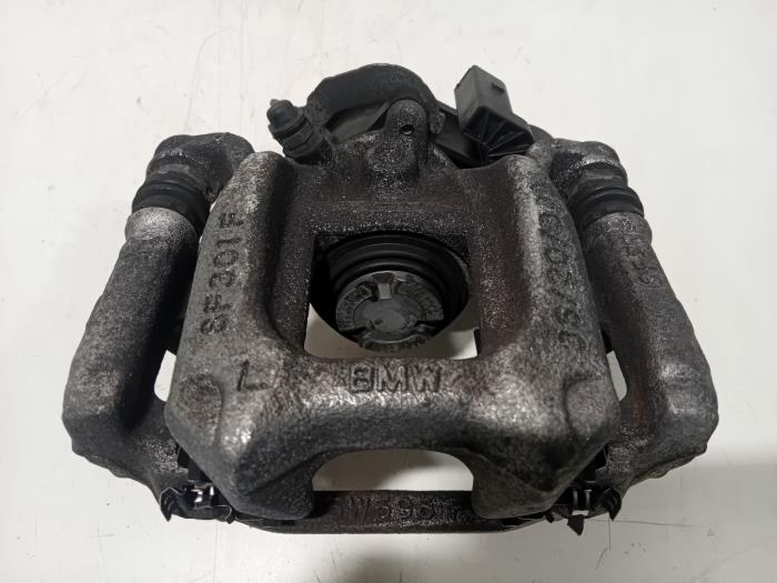 Gebrauchte Bremszange links hinten BMW 2-Serie Preis € 110,99 Margenregelung angeboten von Van der Ven Autorecycling B.V.