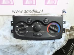 Usados Panel de control de aire acondicionado Chevrolet Kalos (SF48) 1.2 Precio € 24,99 Norma de margen ofrecido por Autodemontage Aandijk