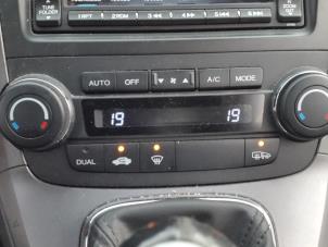 Usados Panel de control de aire acondicionado Honda CR-V (RE) 2.2 i-CTDi 16V Precio € 90,00 Norma de margen ofrecido por Autodemontage Aandijk